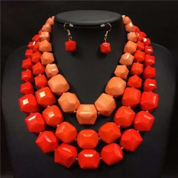 Bead designs for traditional wedding in Nigeria coral red