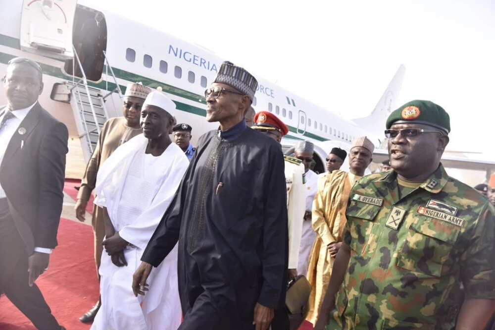 Buhari refuses to answer questions from journalists on return to Nigeria
