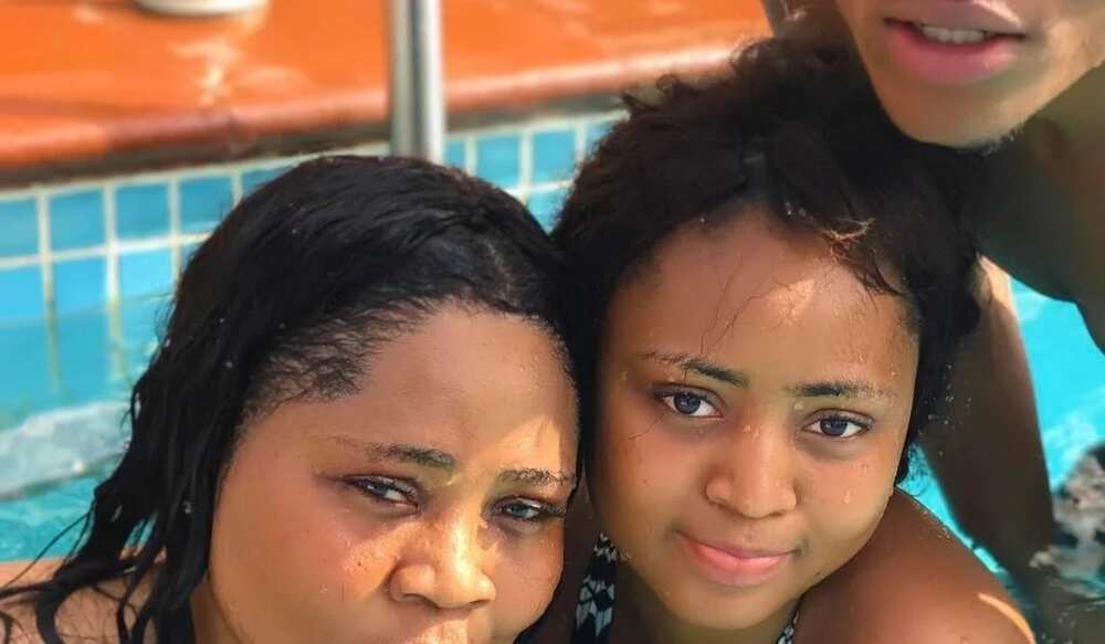 Regina Daniels and her mother in a pool