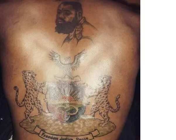Reno Omokri schools Joe Igbokwe, shares photo of man with Ojukwu's face as tattoo