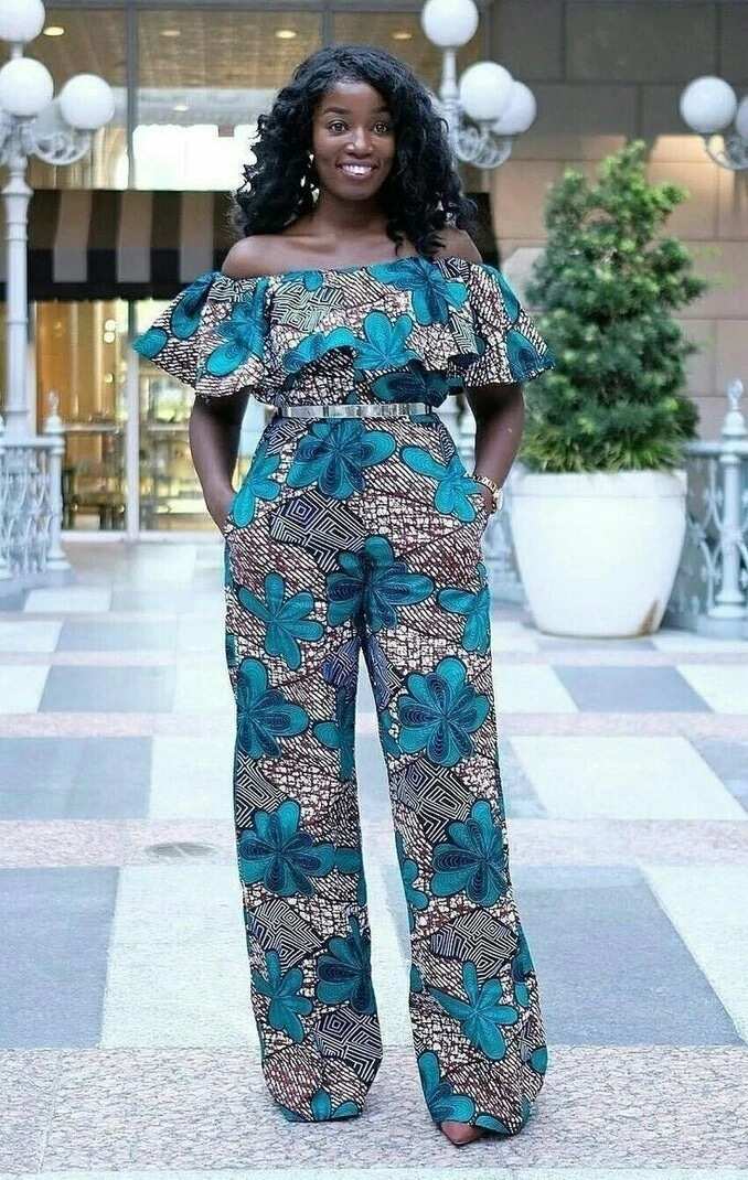 Ankara jumpsuit with open shoulders and wide trousers