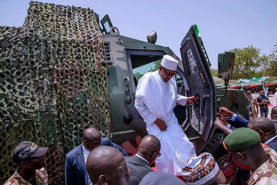 President Buhari testing the locally manufactured armoured carrier. Photo source: Femi Adesina