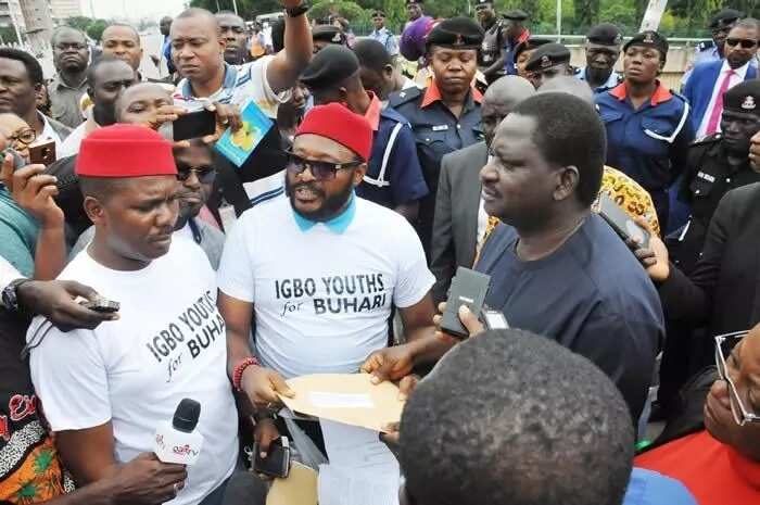 Special Adviser to the President on Media, Femi Adesina (r) receiving a letter from the Coordinators of Coalition of Ibo Groups for Buhari, Hon. Demian Igbokwe (l) and Hon. Nkem . Photo credit: NAN