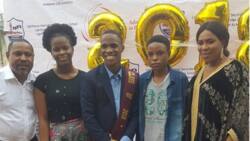 Saidi Balogun and Fathia Williams celebrate their son's graduation from secondary school