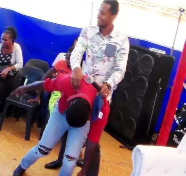 Pastor Penuel Mnguni rides member like a horse (photos)