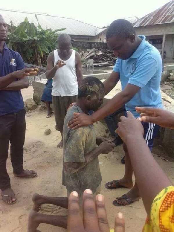 Man caught stealing at church in Warri, Delta state, receives prayers from members (Photos)