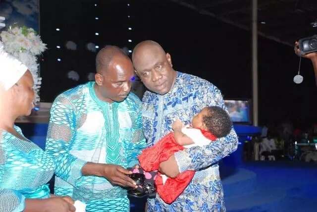 Pastor who welcomed baby after 32 years of childlessness dedicates her to God (photos)