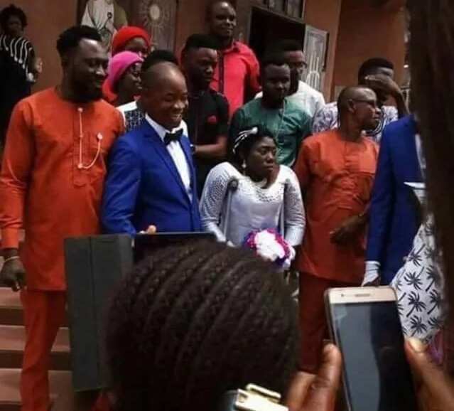Physically challenged woman and husband at wedding
Source: Facebook, Gistreel
