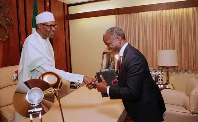 President Muhammadu Buhari receives briefing from VP Osinbajo