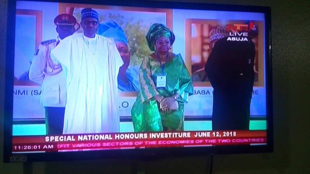 June 12 honours: Fawehinmi’s wife, son all smiles as they arrive Aso Rock
