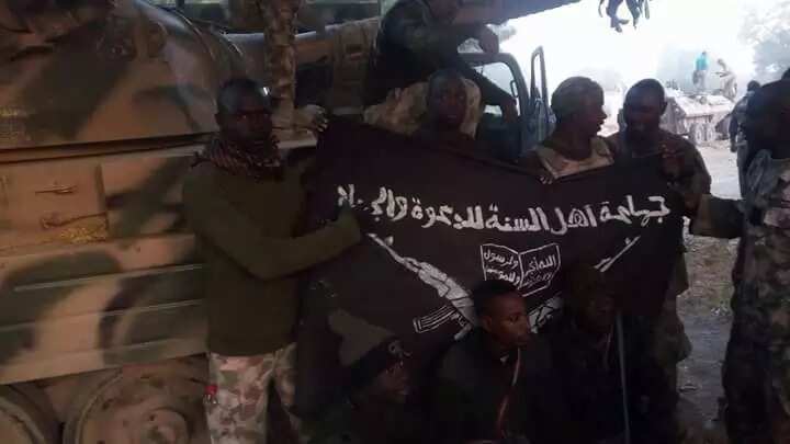 Army presents Buhari with Boko Haram flag