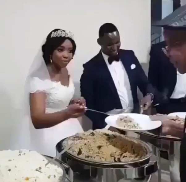 Beautiful couple seen serving guests at their wedding (video)