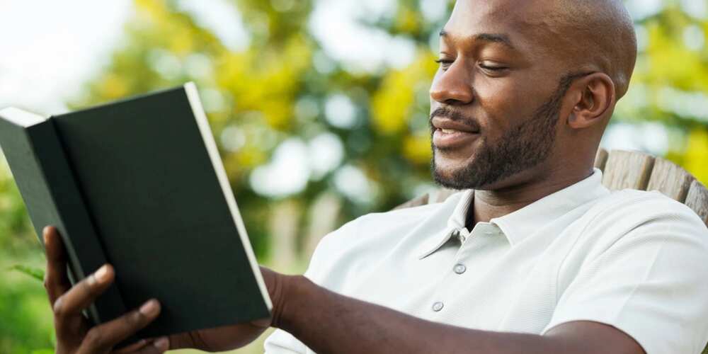 A man reading a book A man reading a book