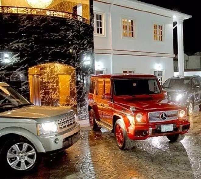 Kcee's house with cars parked in front