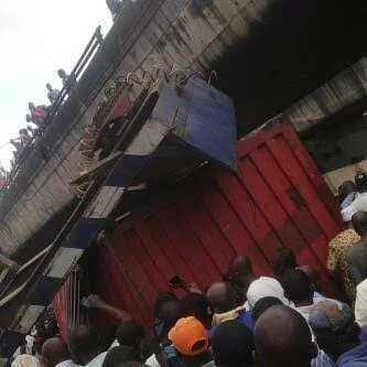 PHOTOS: Trailer Skids On Ojuelegba Bridge, Lands On Cars