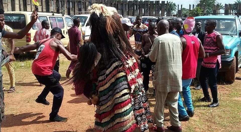 Family members of Reverend Father being ordained storm church with masquerades in Imo (photos)