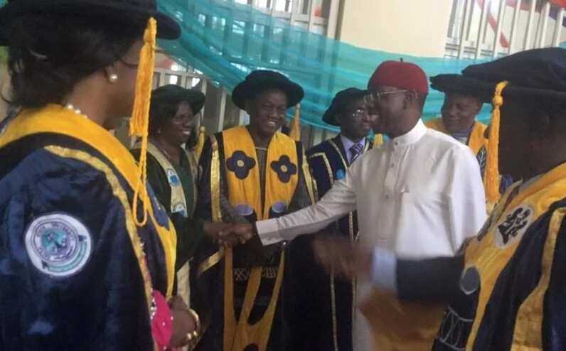 Governor shaking hands with university heads
Source: Facebook, Ossai Ovie Success