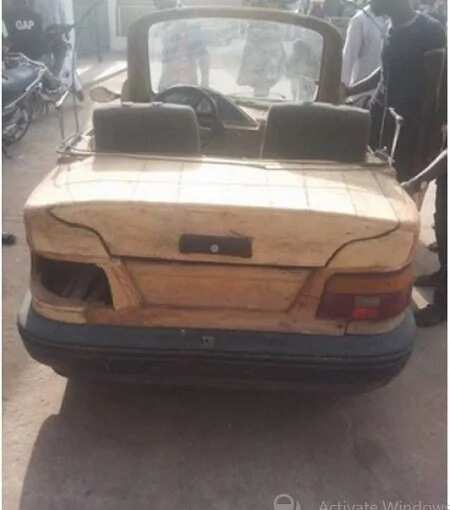 Nigerian constructs a car with wood and motorcycle engine