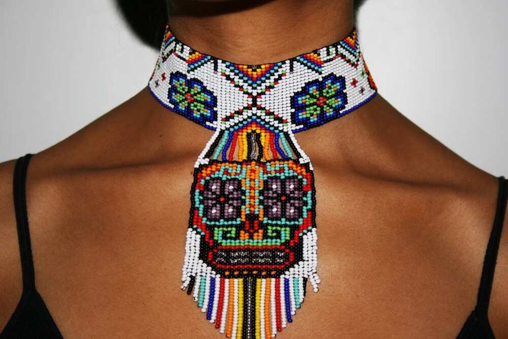 Beaded choker with ornament Beaded choker with ornament
