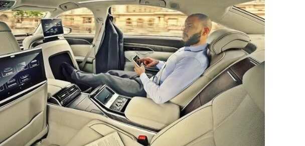 2016 Mr Ideal Nigeria, Prince Ehirim, photoshops himself into the 2018 Audi A8 to deceive his unsuspecting followers (photos)