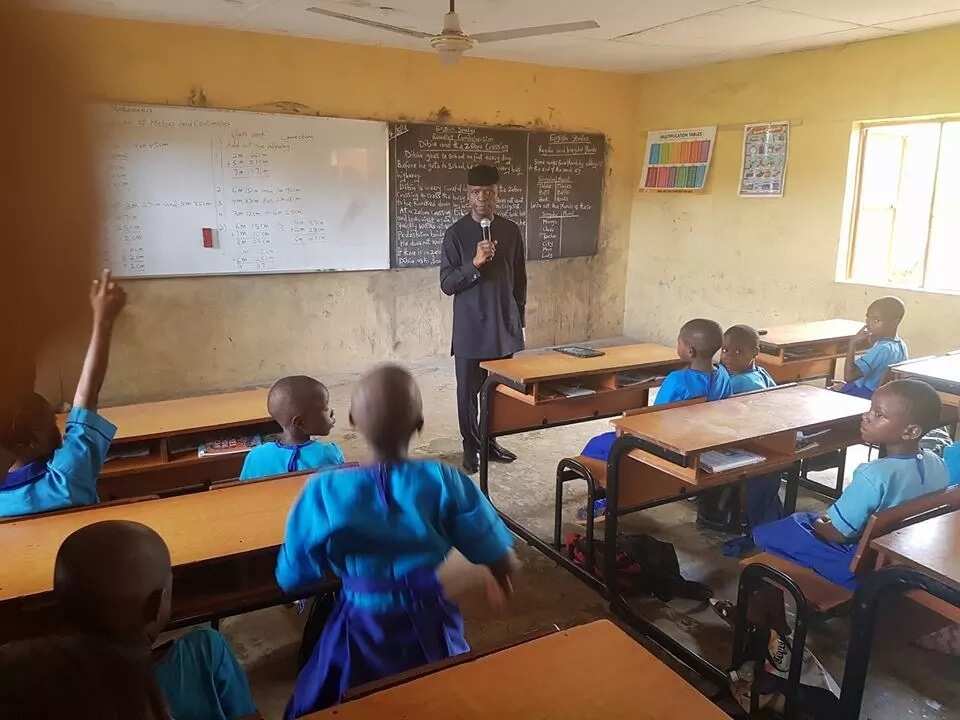 VP Osinbajo shares meal with pupils in Ondo