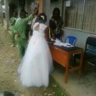 Female Youth Corper Storms LG In Her Wedding Gown (Photos)