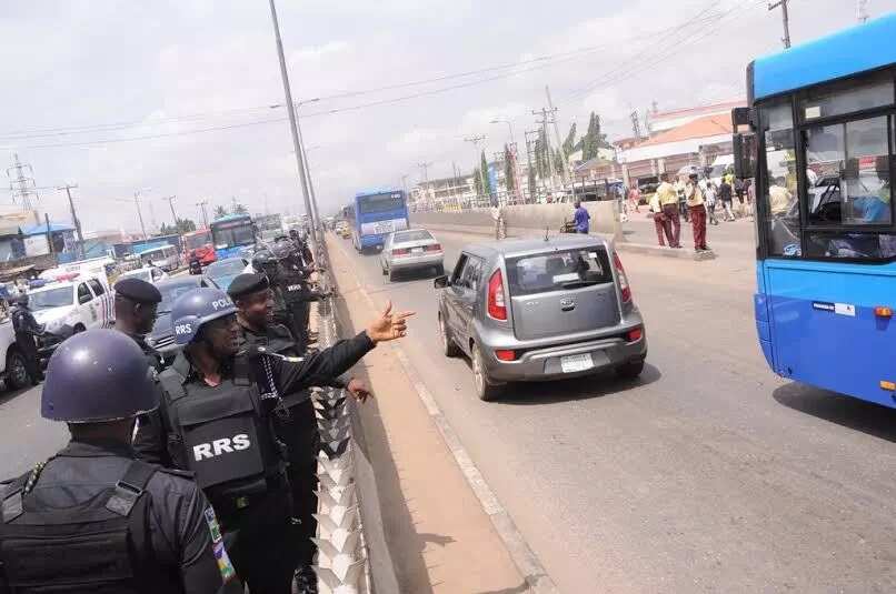 Police maintains law and order at Ojota pedestrian bridge
