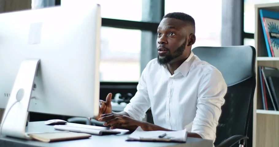 computer office african working person successful young businessman entrepreneur technology male nigeria entrepreneurs engineering portrait smart legit useful tips 4k