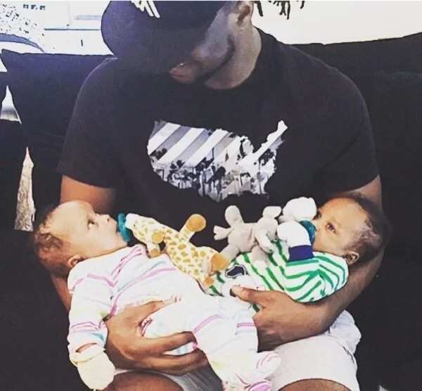 Pal Okoye carryign his twin babies in his arms for the first time
Source: Instagram, Paul Okoye