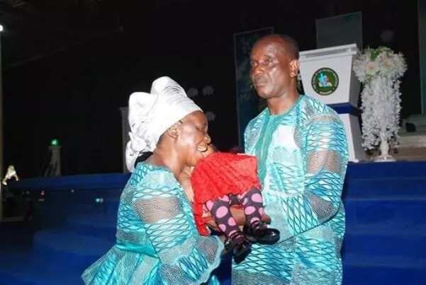 Pastor who welcomed baby after 32 years of childlessness dedicates her to God (photos)