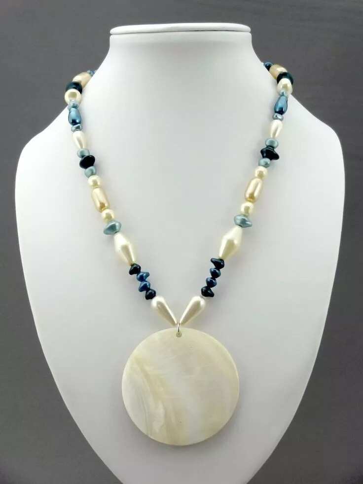 Necklace with beads and large pendant