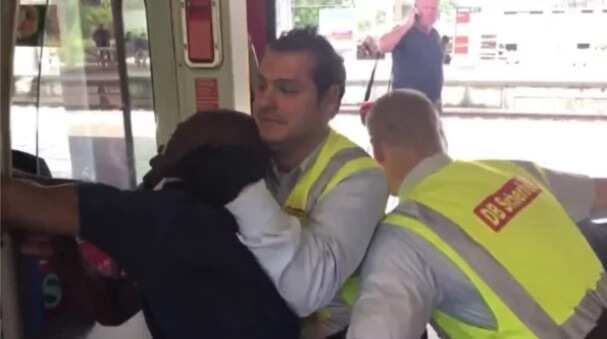 48-year-old Nigerian man forcefully pulled out of a train by inspectors in Germany (video)
