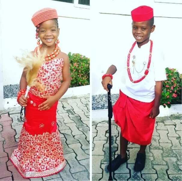 Igbo traditional attire for boy with a red wrapper and white tunic (Jason and Ada Okpocha, www.bellanaija.com)