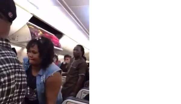 Nigerian lady kicked off Turkish flight for assaulting air hostess (photos, video)
