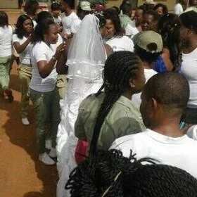 Female Youth Corper Storms LG In Her Wedding Gown (Photos)
