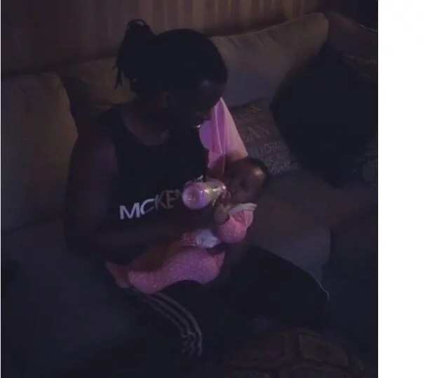 Paul Okoye shares video of him feeding one of his twins early in the morning