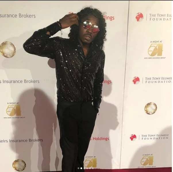 Comedian Bovi steps out to an event in long weave-on like old school stars (photos)