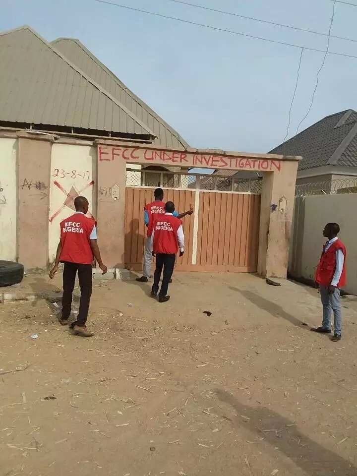 EFCC officials in front of one of the properties
Source: Facebook, EFCC