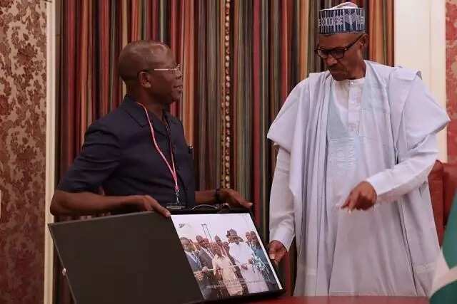 Oshiomhole visits Buhari at Aso Rock, presents gift