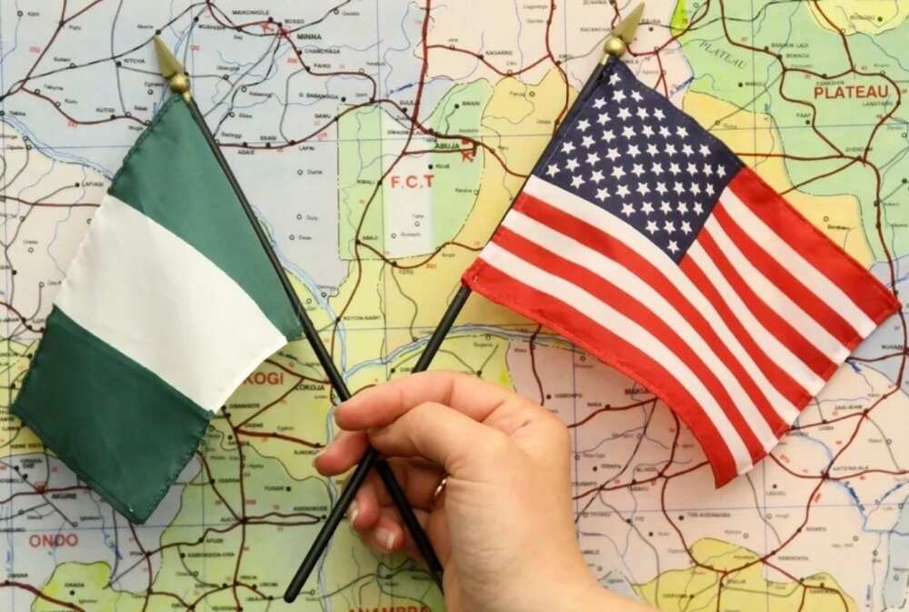 Nigerian and United States flags Nigerian and United States flags